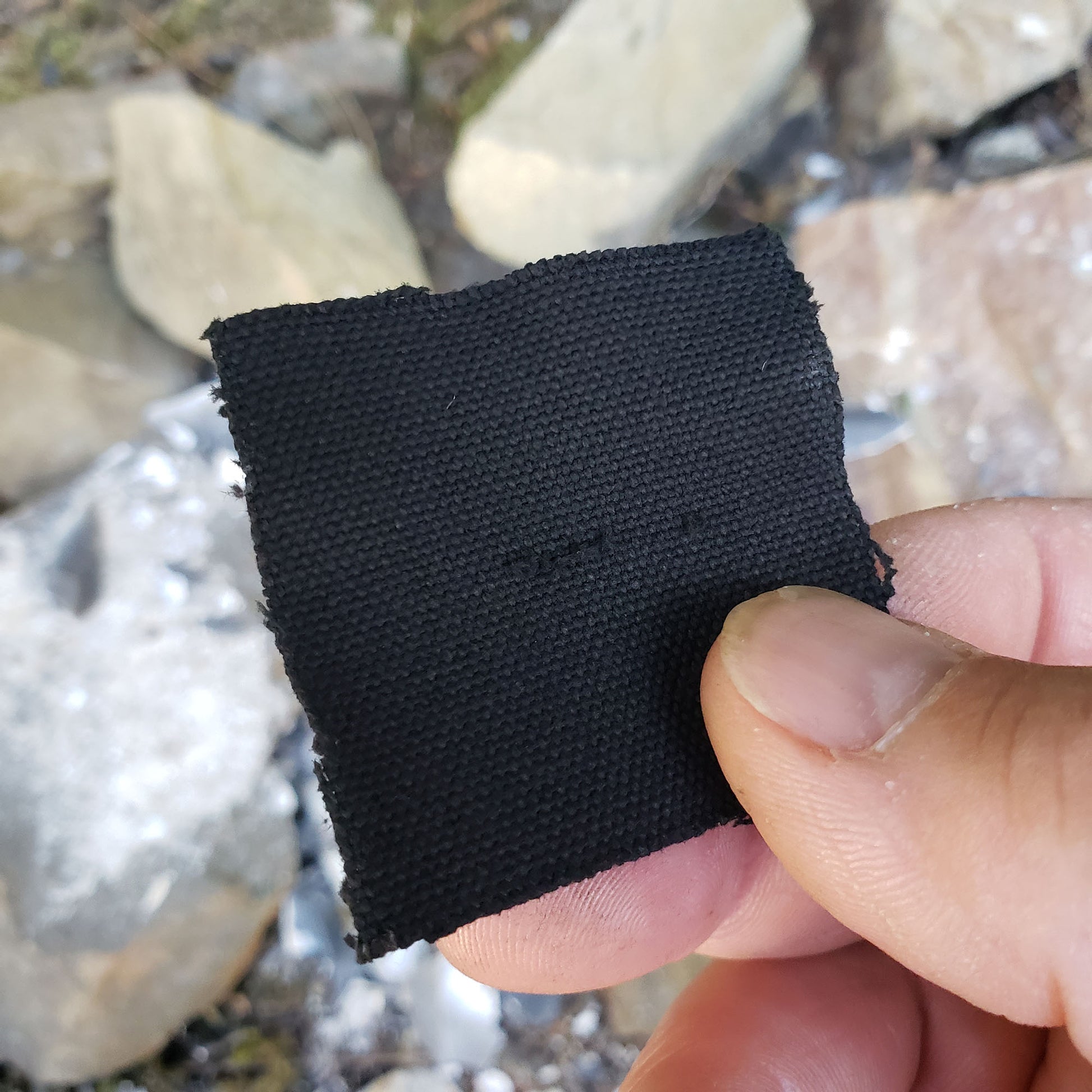 charred cloth squares