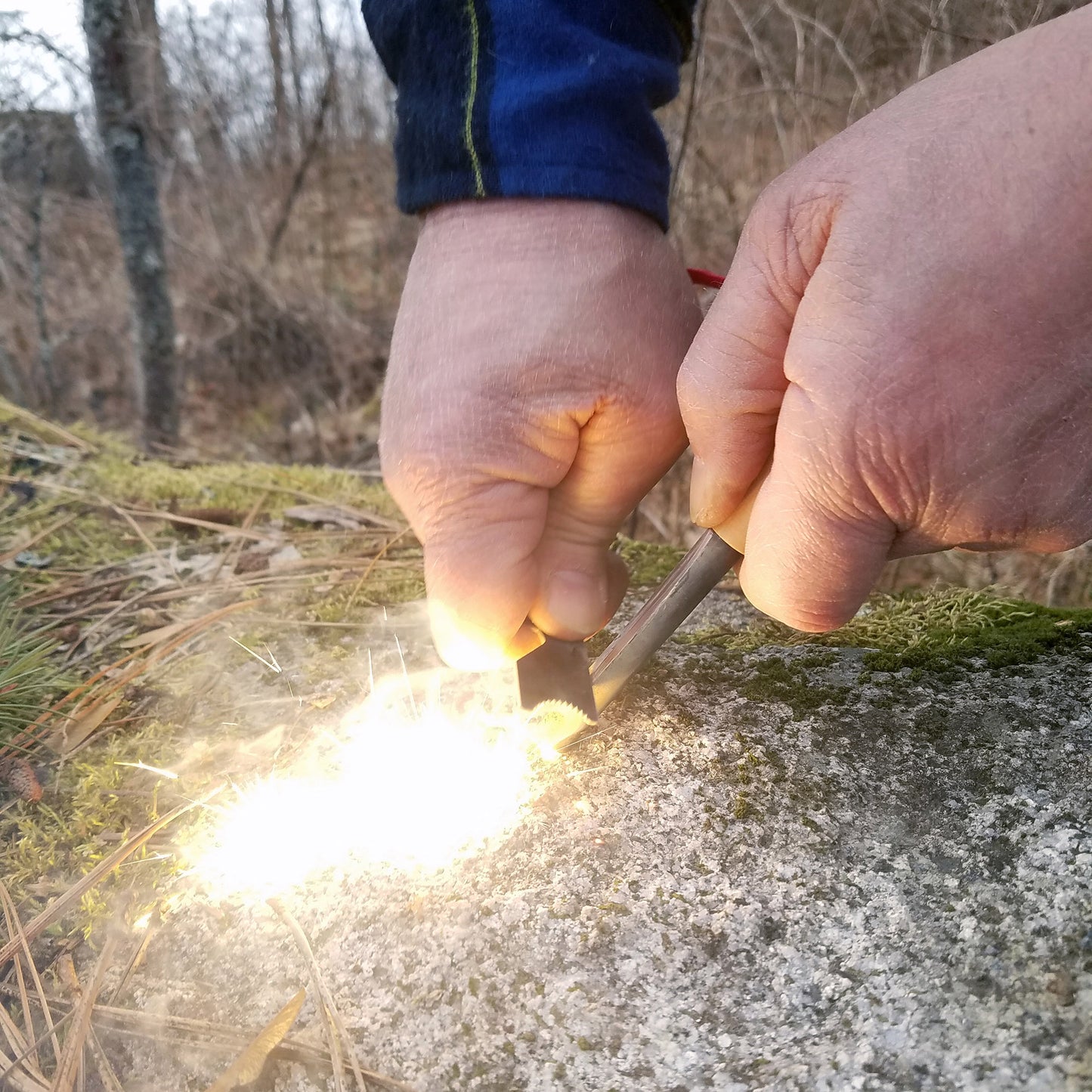 Ferro rod throwing a shower of white hot sparks will quickly start a fire.