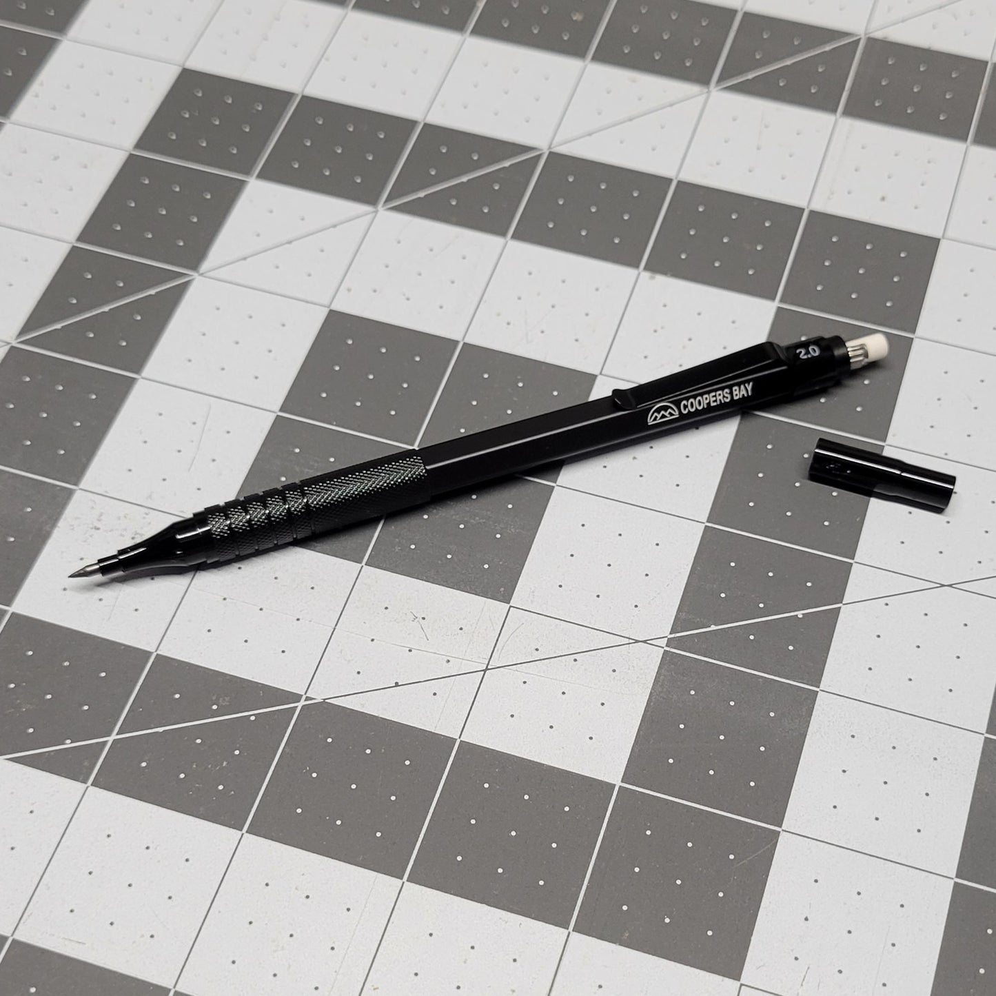 Outdoor clicker pencil with eraser