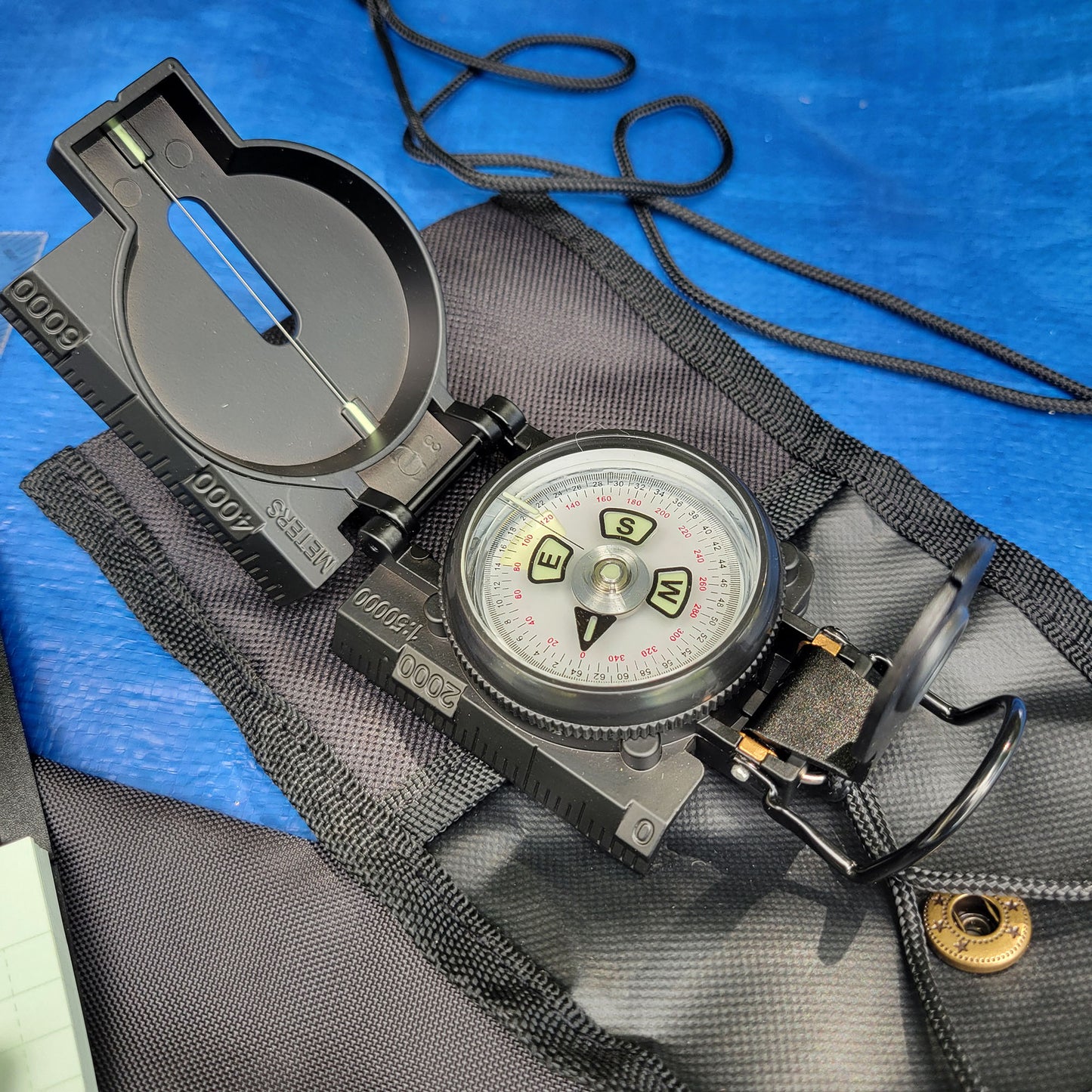 black military style compass
