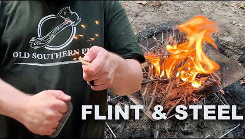 Load video: How to use flint &amp; steel to start a fire