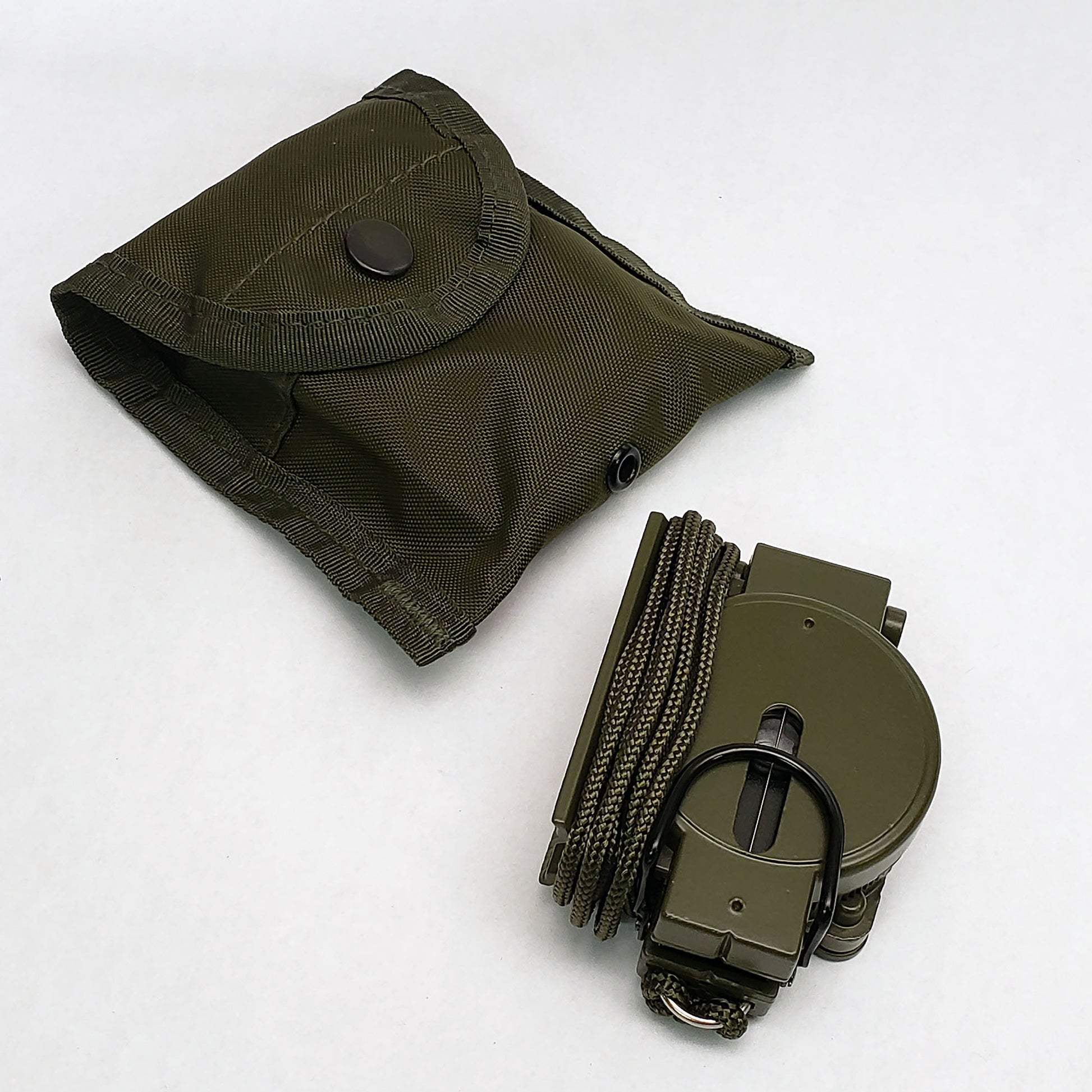 The Coopers Bay Scout model compass includes a neck lanyard and nylon carry pouch